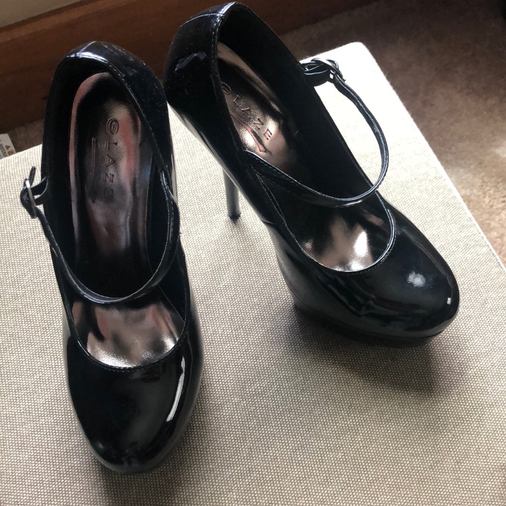Black Mary Jane type heels.